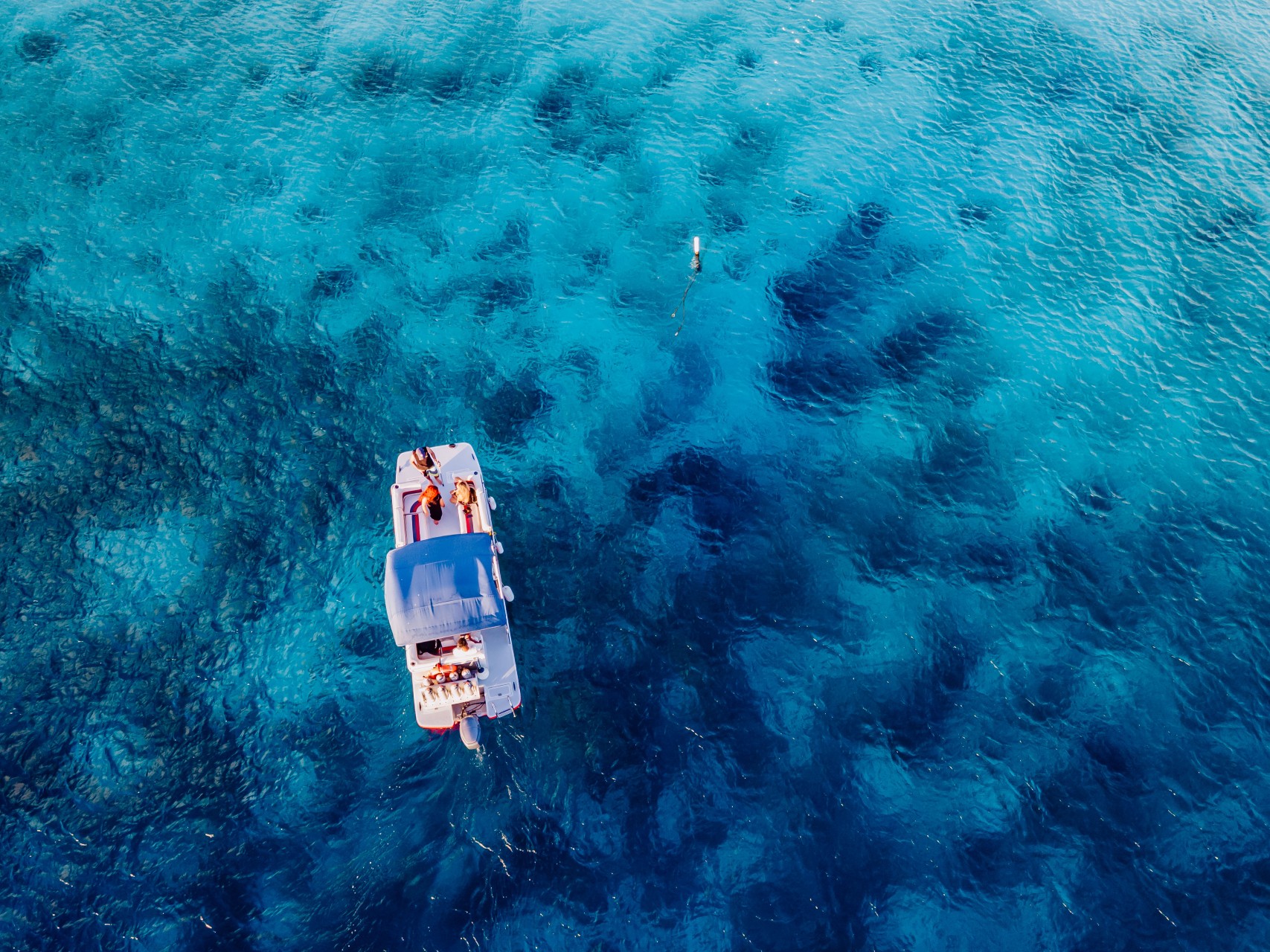 Aerial view of a dive boat over the reef at Klein Bonaire