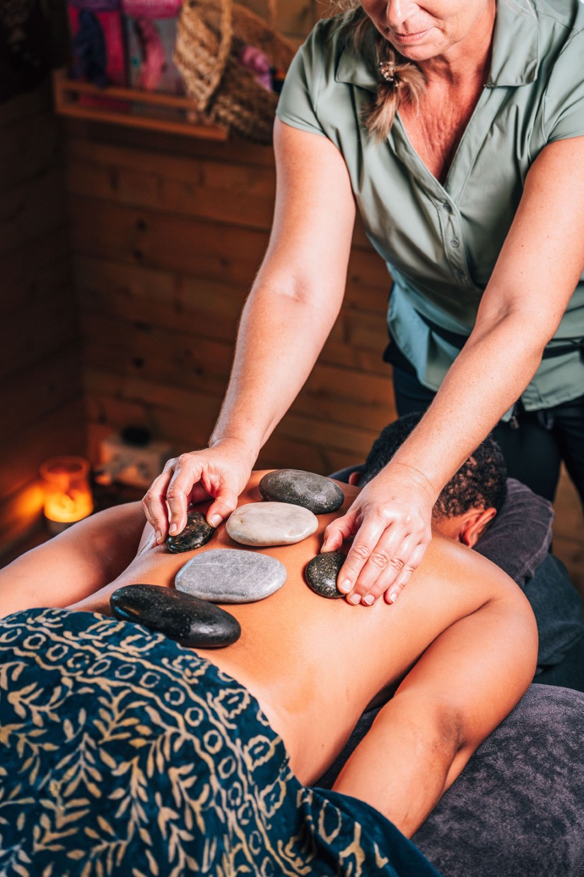 Hot stone massage treatment on Bonaire